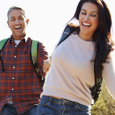 Couple Happily Hiking